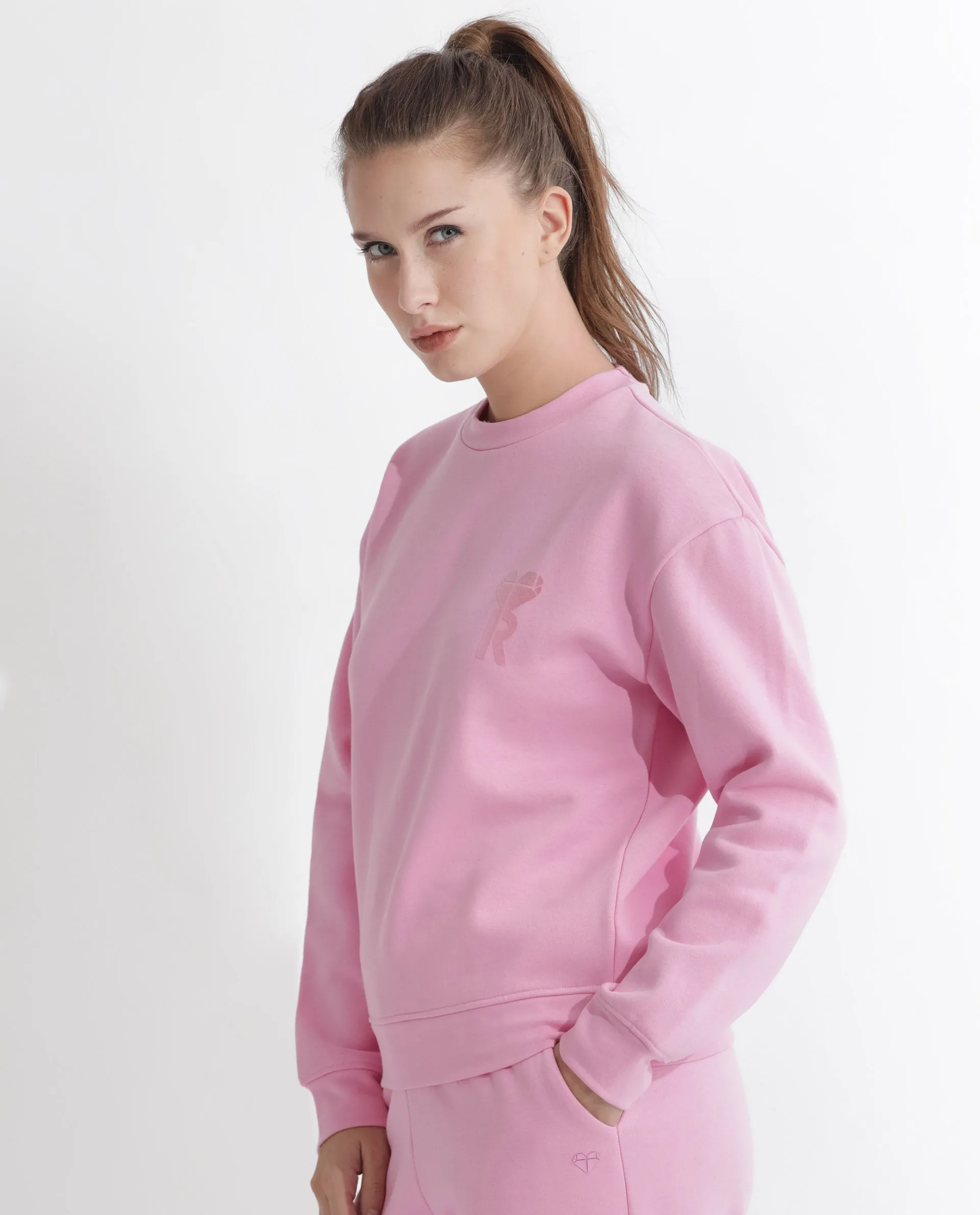 Rareism Articale Women Pelser Light Pink Poly Cotton Fabric Full Sleeves Cuffed Sleeve Ribbed Collar Relaxed Fit Plain Sweatshirt